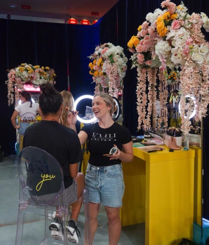 A University of Houston student gets glam at the Be You Women’s Empowerment series.